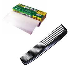Measure out the paper to fit
the comb from back to front